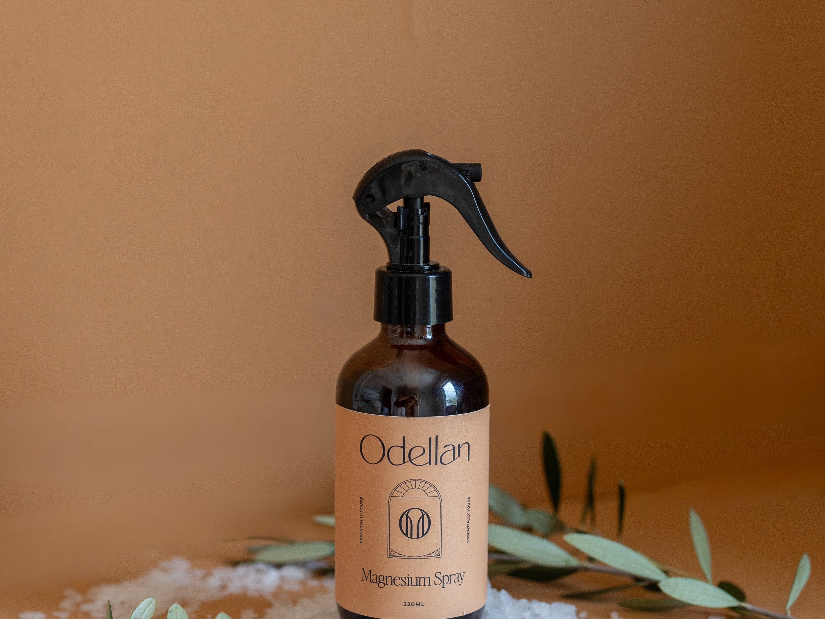 magnesium spray bottle on bedside table for better sleep