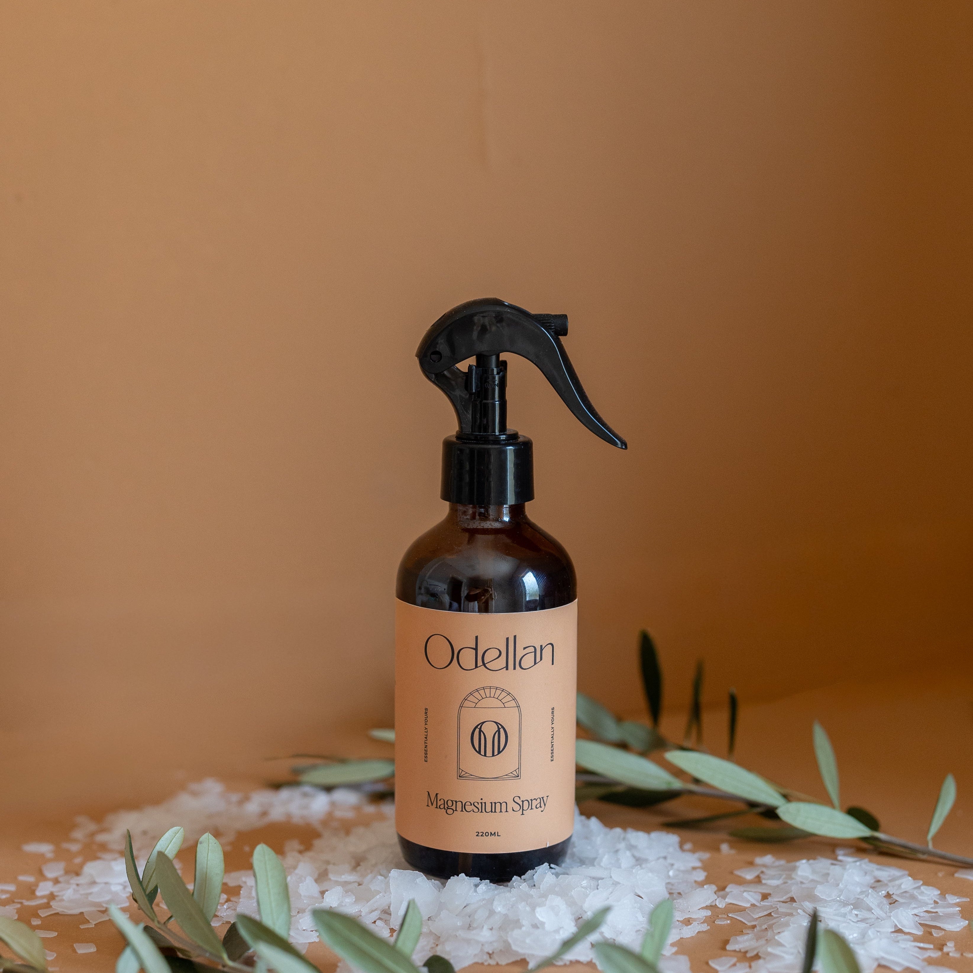 magnesium spray bottle on bedside table for better sleep